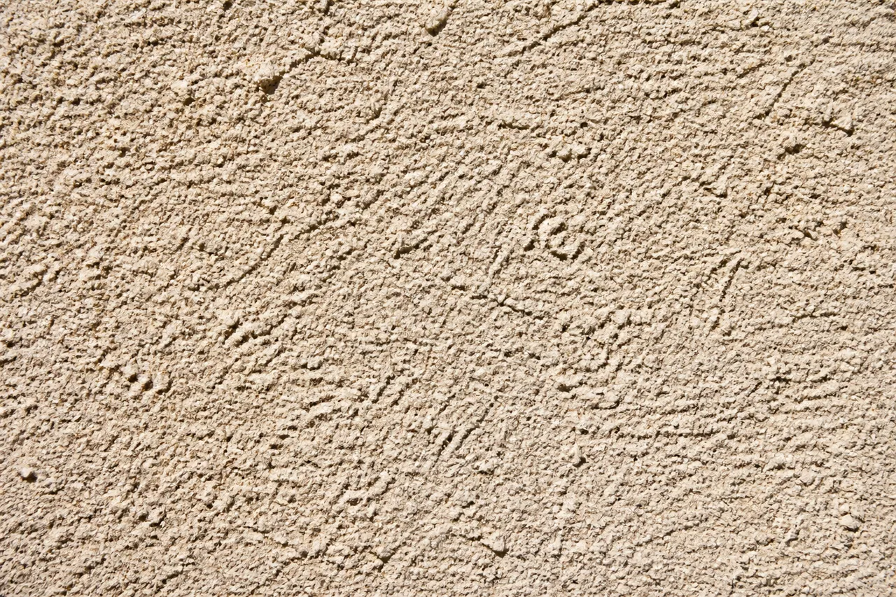 Texture du revêtement plastique épais de façade